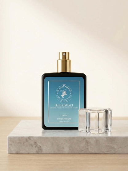 Perfume bottle labeled 'Flora Impact' on a marble surface with a candle.